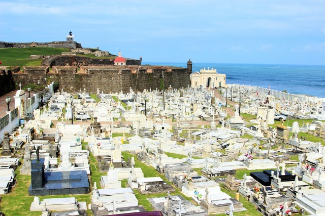 Morro Castle in the background along with the church and grave yard by the ocean.