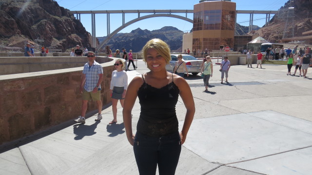 Africah at the Hoover Dam with the Mike O’Callaghan-Pat Tillman Memorial Bridge in the background.